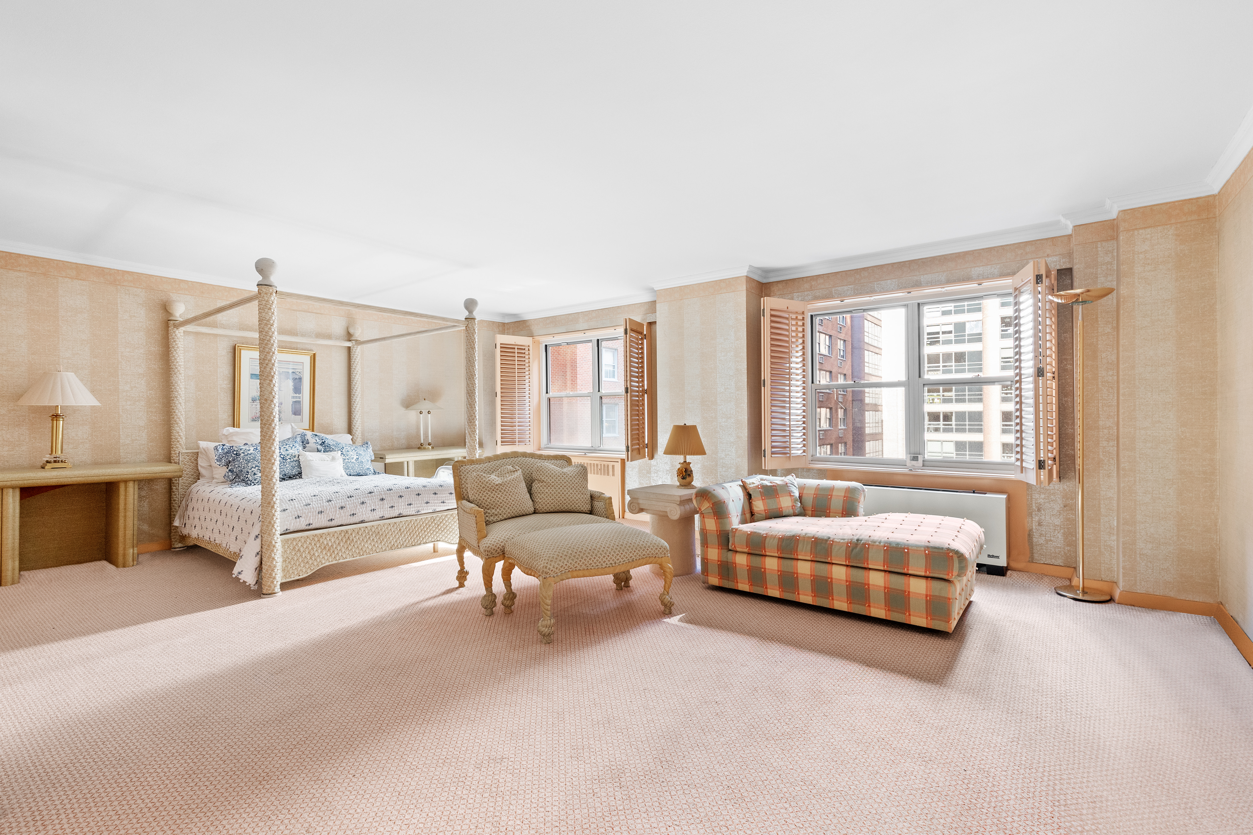 50 Sutton Place South, Unit 7A Manhattan, NY 10022 - Photo 11 of 16 a living room with furniture and a large window