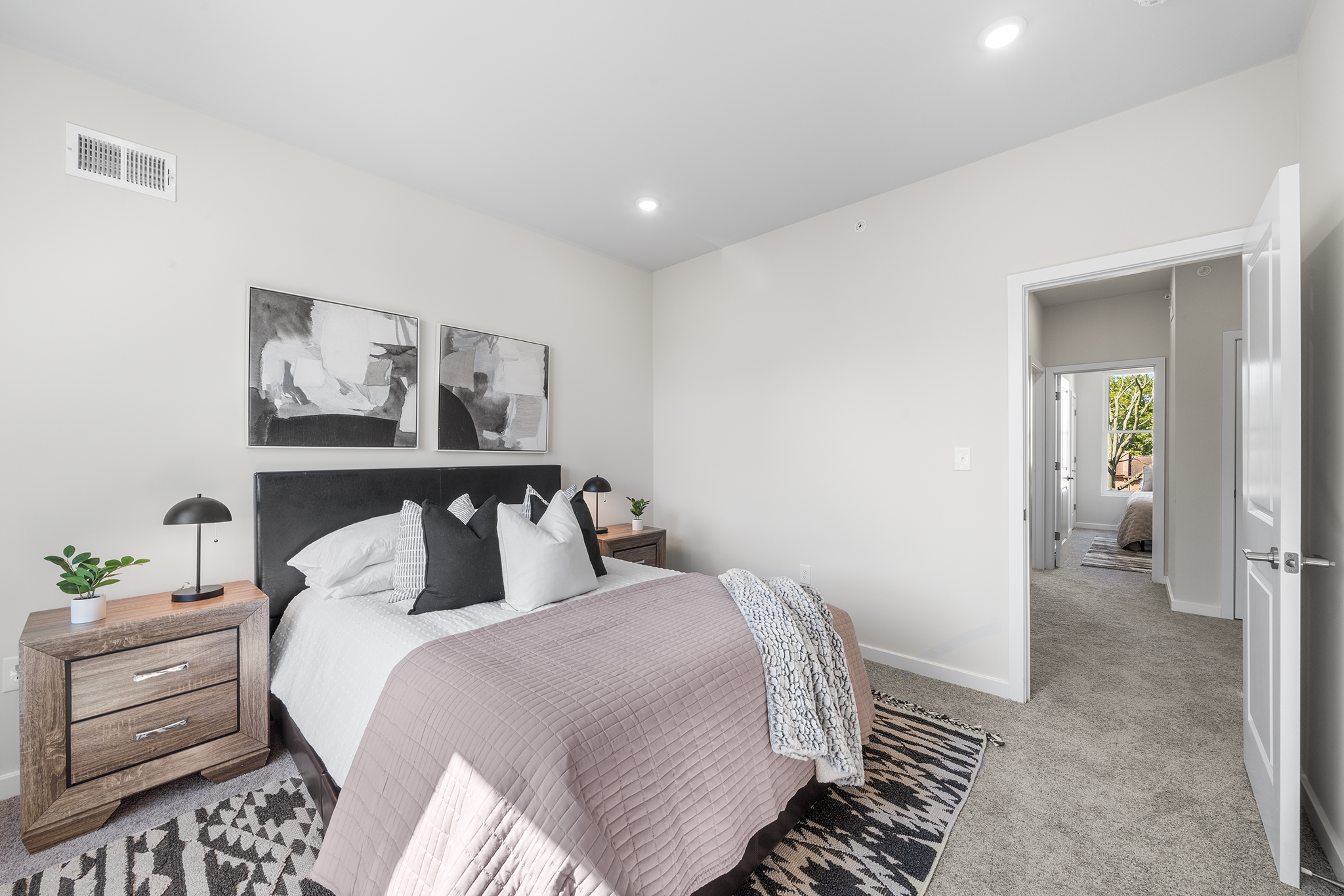 534 North 54th Street, Unit A Philadelphia, PA 19131 - Photo 15 of 22 a bedroom with a bed and painting on the wall