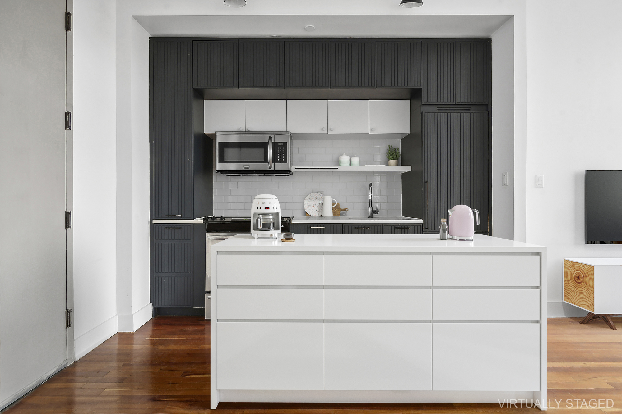 180 Bainbridge Street, Unit 305 Brooklyn, NY 11233 - Photo 3 of 23 a kitchen with a cabinets and a wooden floor