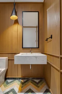 a room with pool table and a chandelier