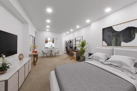 a bathroom with a toilet a sink and bathtub