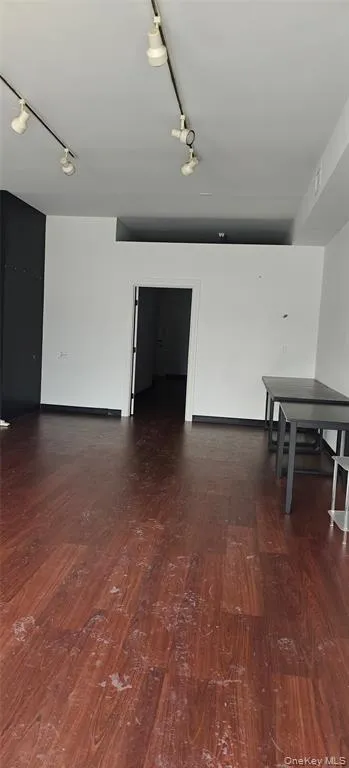 a view of a room with lots of furniture