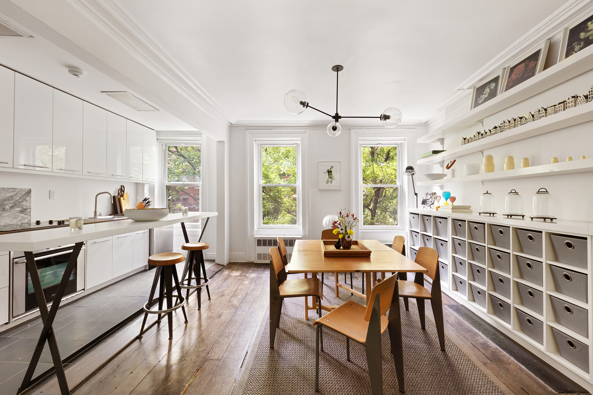 456 West 25th Street Manhattan, NY 10001 - Photo 16 of 22 a view of a dining room with furniture window and wooden floor