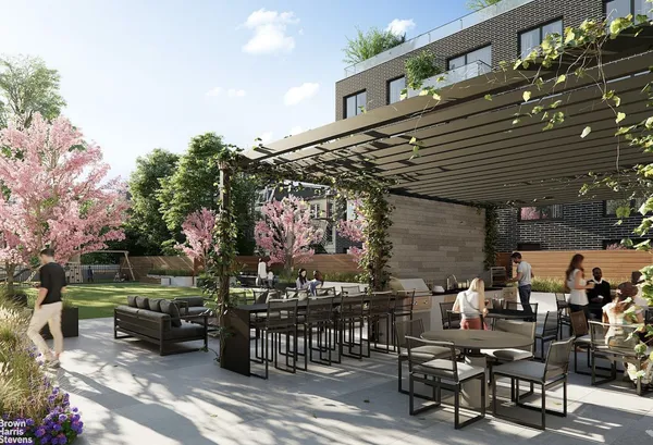 a view of a patio with table and chairs and potted plants