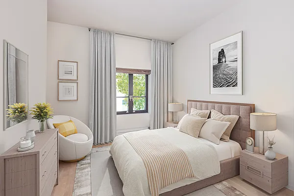 215 Sullivan Street, Unit THC Manhattan, NY 10012 - Photo 10 of 16 a spacious bedroom with a bed and window