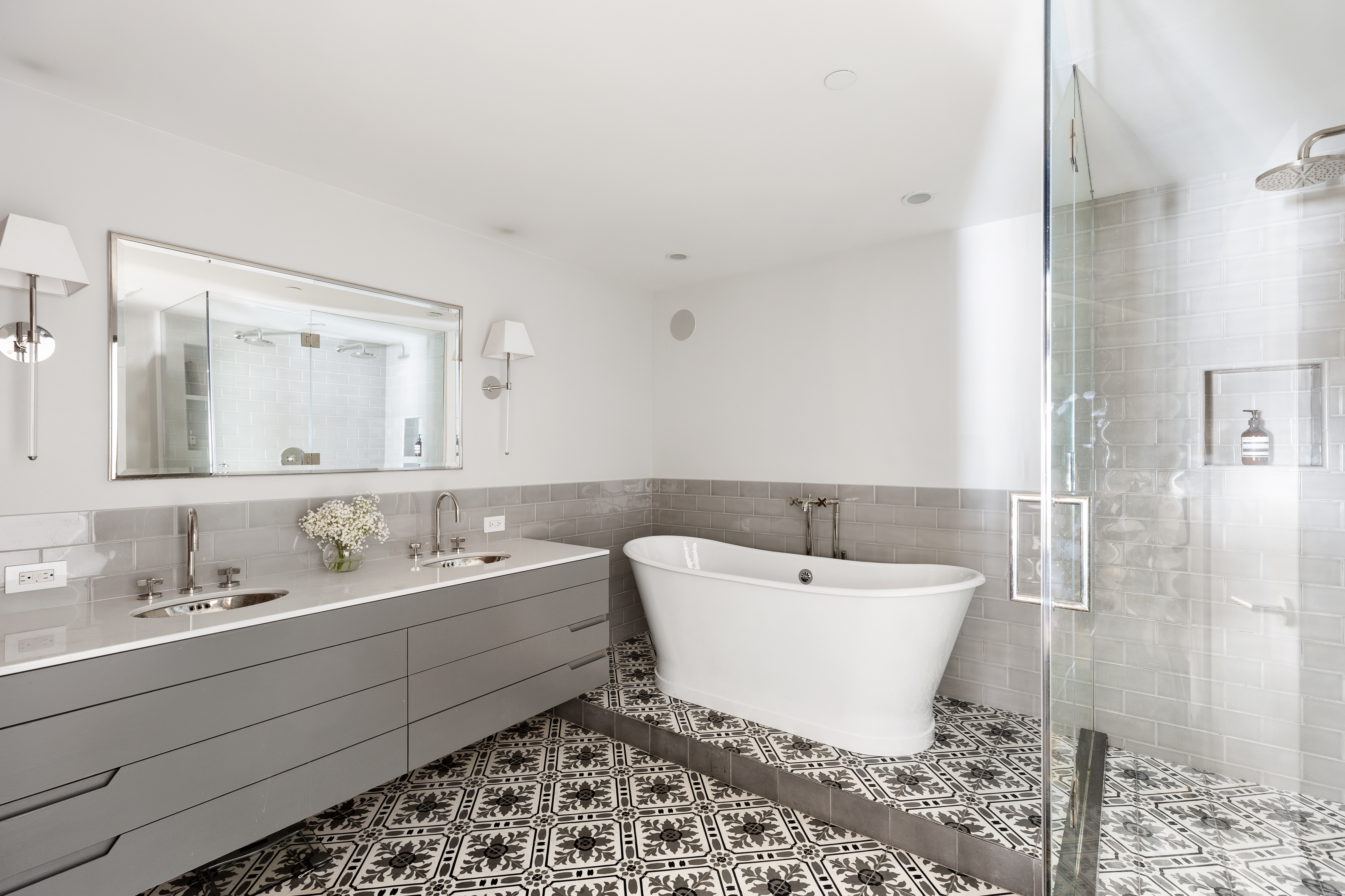 466 Washington Street, Unit 3W Manhattan, NY 10013 - Photo 8 of 14 a bathroom with a sink and a mirror