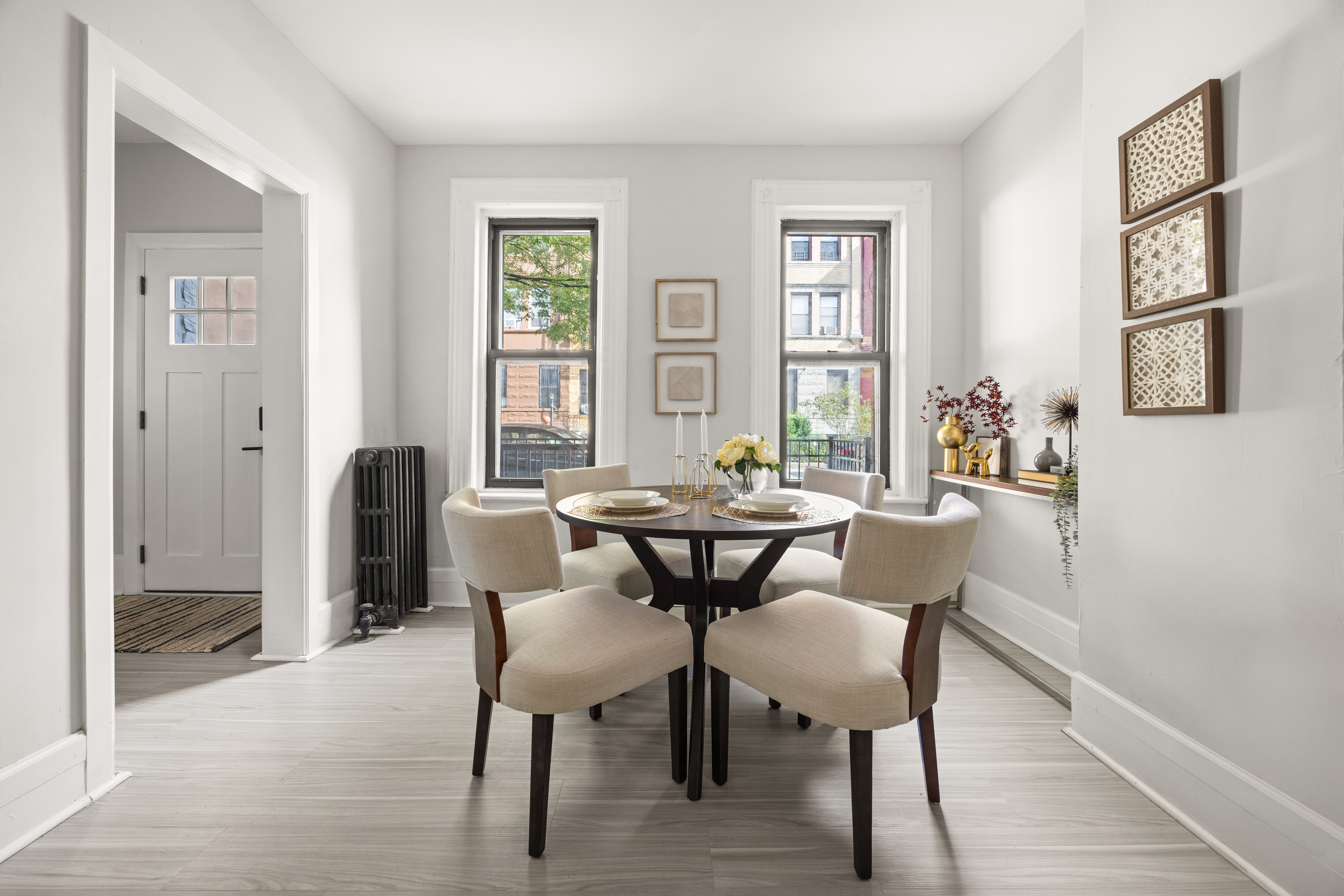 1588 Lincoln Place Brooklyn, NY 11233 - Photo 4 of 12 a view of a dining room with furniture and wooden floor