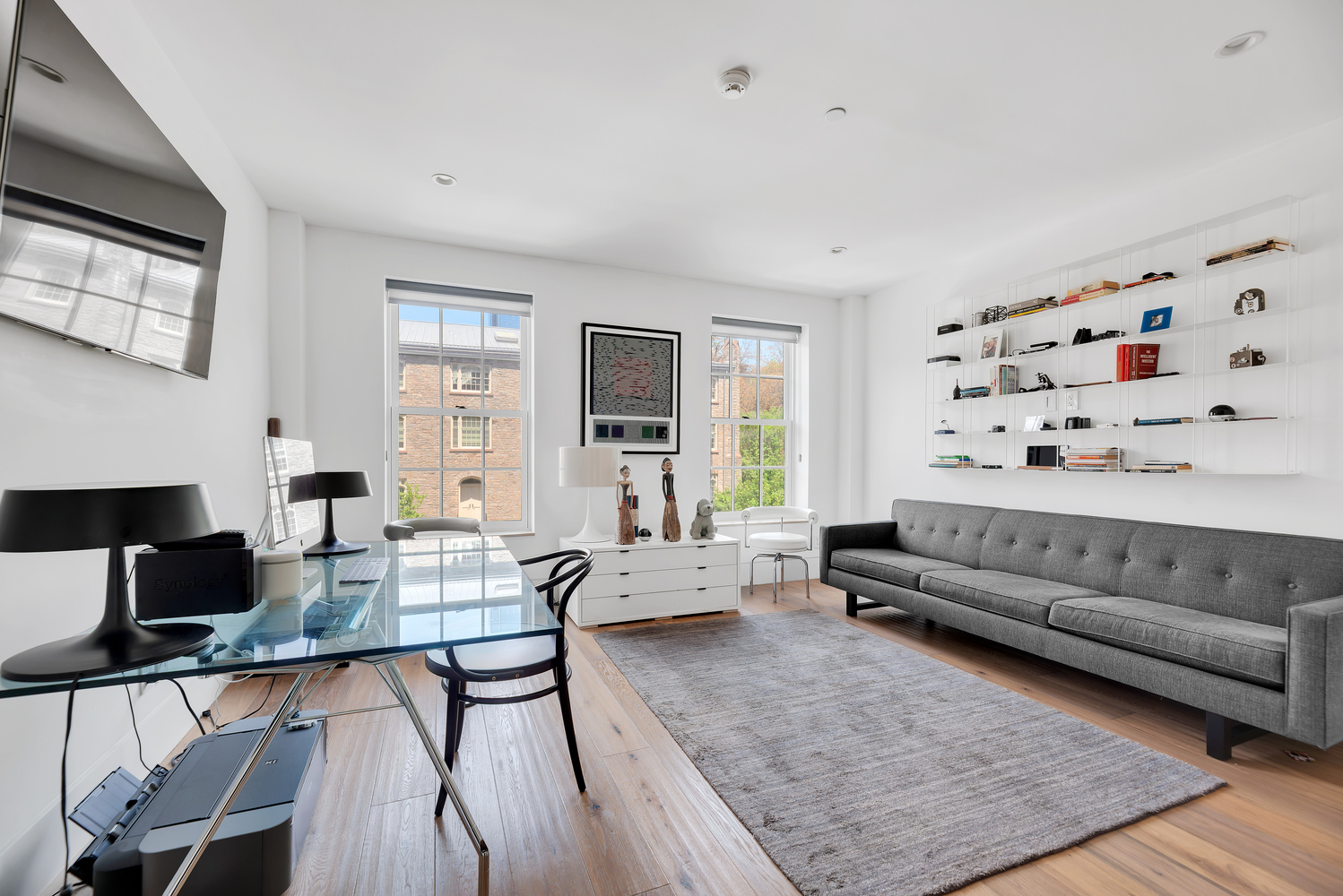 440 West 20th Street Manhattan, NY 10011 - Photo 14 of 20 a living room with furniture window and flat screen tv