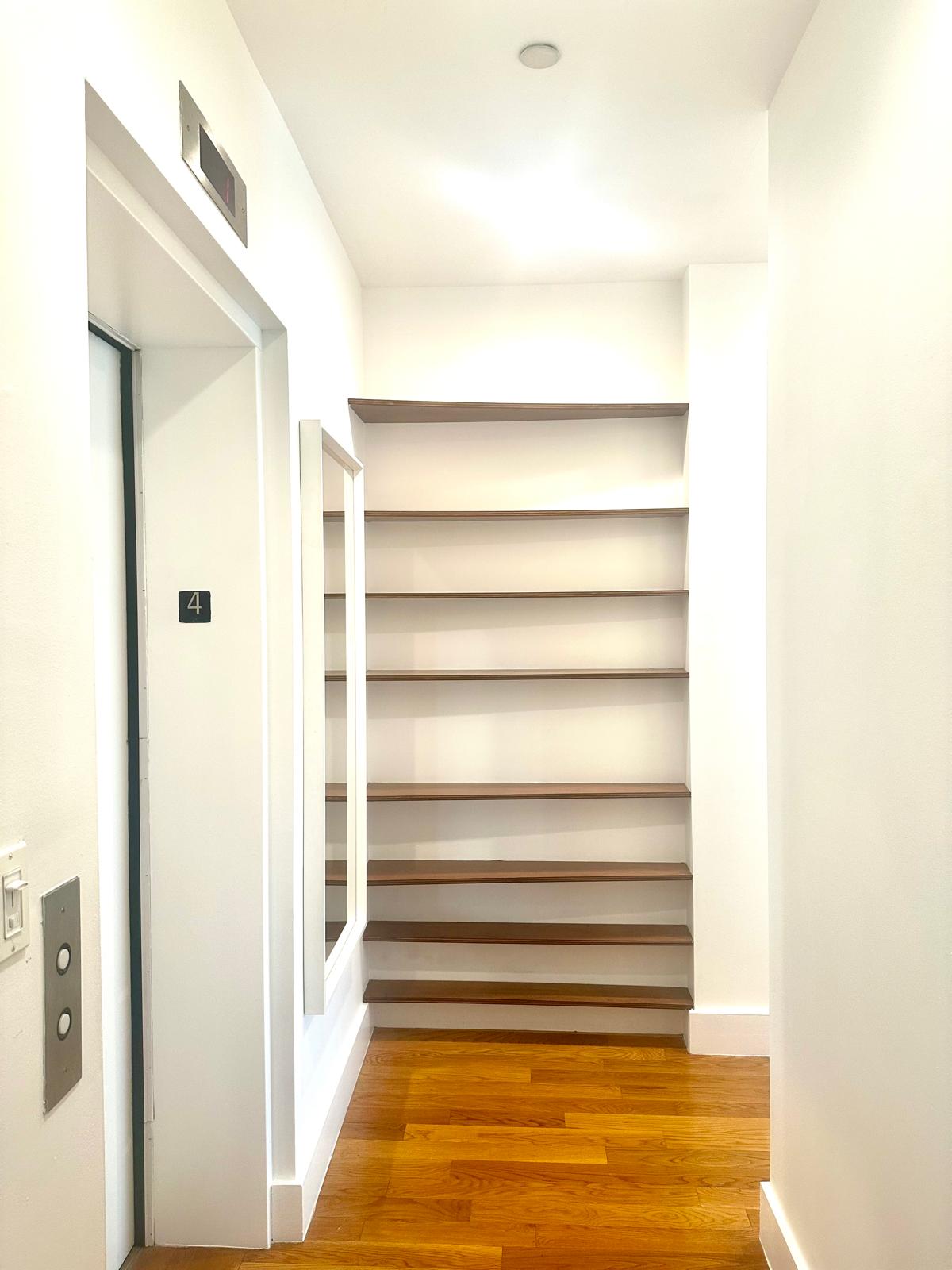 221 West 148th Street, Unit 4A Manhattan, NY 10039 - Photo 10 of 11 a view of walk in closet with empty racks