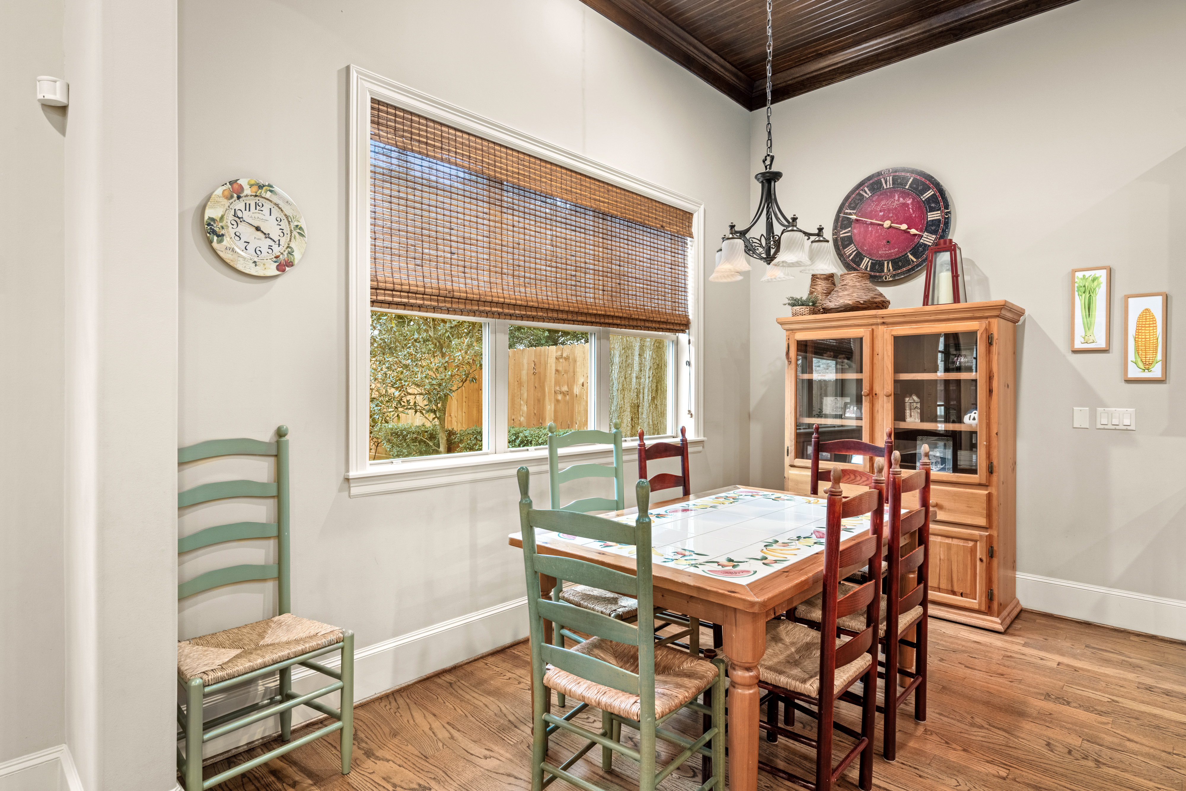 4219 Oberlin Street West University Place, TX 77005 - Photo 10 of 33 a view of a dining room with furniture window and wooden floor
