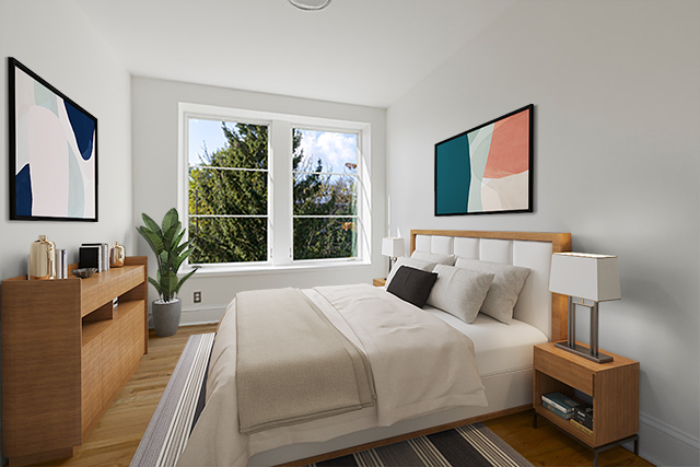 993 Lorimer Street, Unit 2 Brooklyn, NY 11222 - Photo 8 of 15 a bedroom with a bed a couch and a window