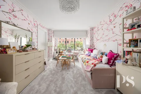 a bathroom with a sink a toilet and a shower