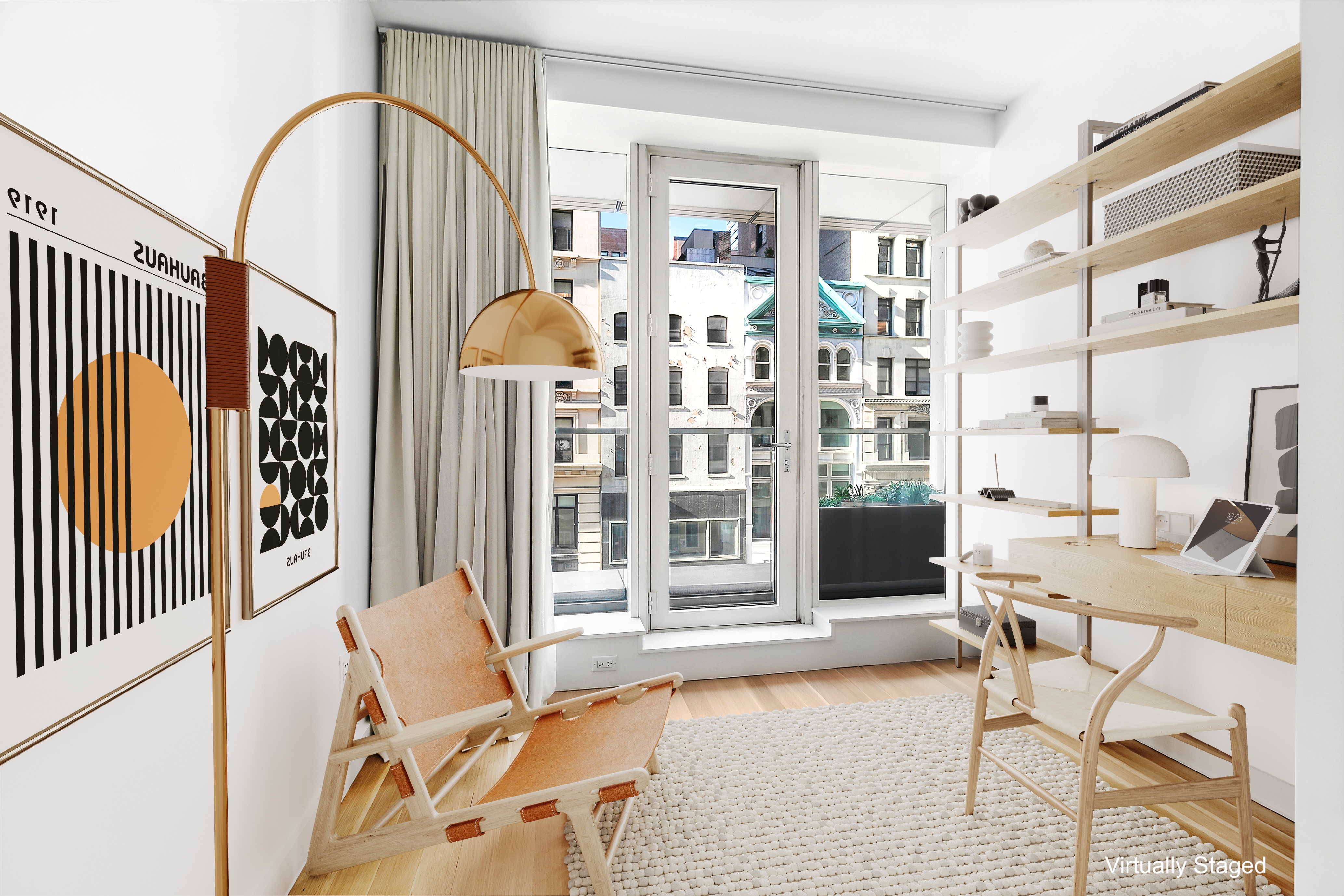 241 5th Avenue, Unit 4B Manhattan, NY 10016 - Photo 8 of 12 a balcony with table and chairs