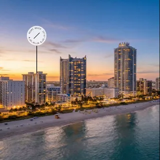 a view of a ocean with tall building