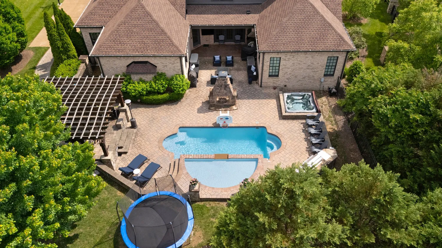 an aerial view of a house with a garden