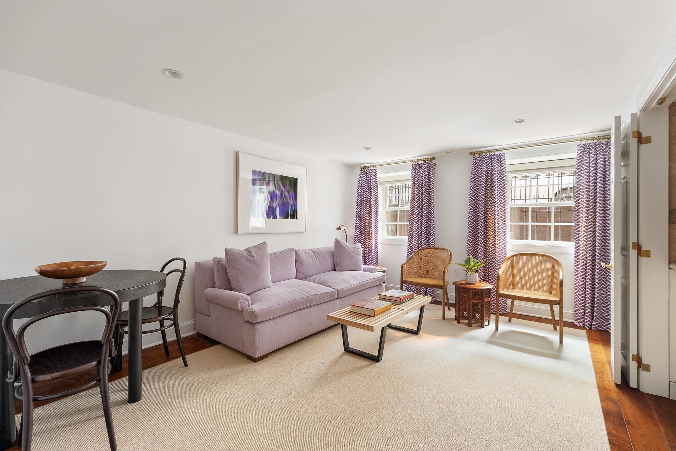 12 Leroy Street Manhattan, NY 10014 - Photo 15 of 20 a living room with furniture and a lamp
