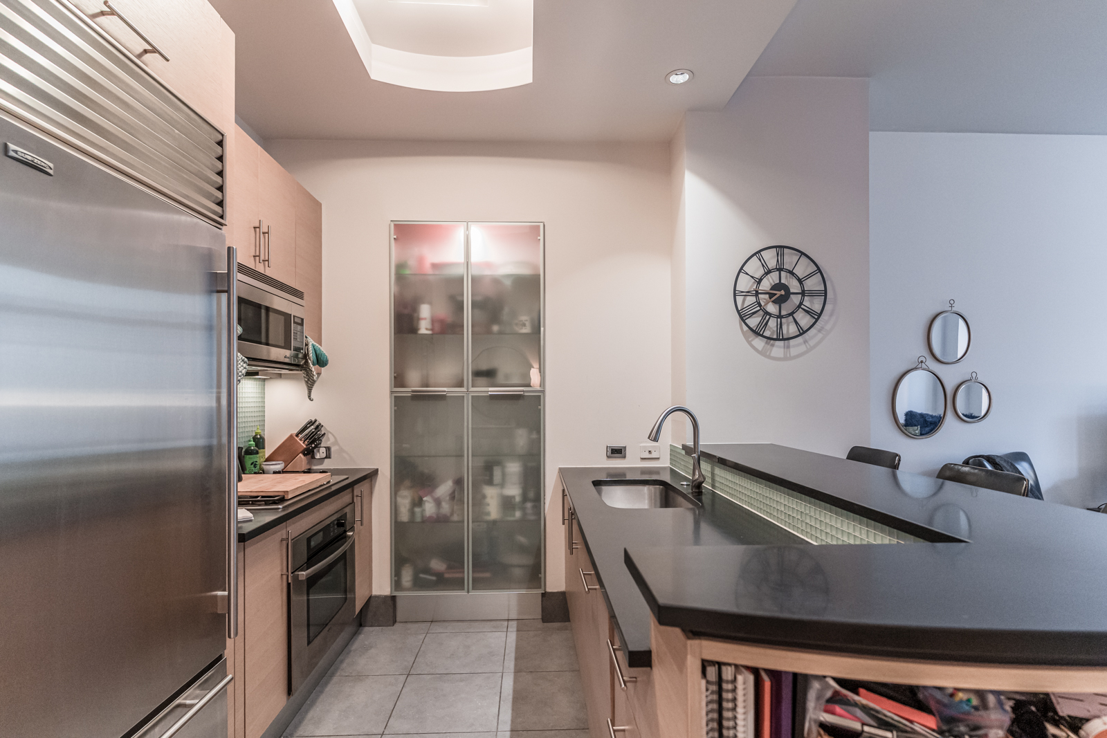 325 5th Avenue, Unit 14E Manhattan, NY 10016 - Photo 6 of 19 a kitchen with a refrigerator and a sink