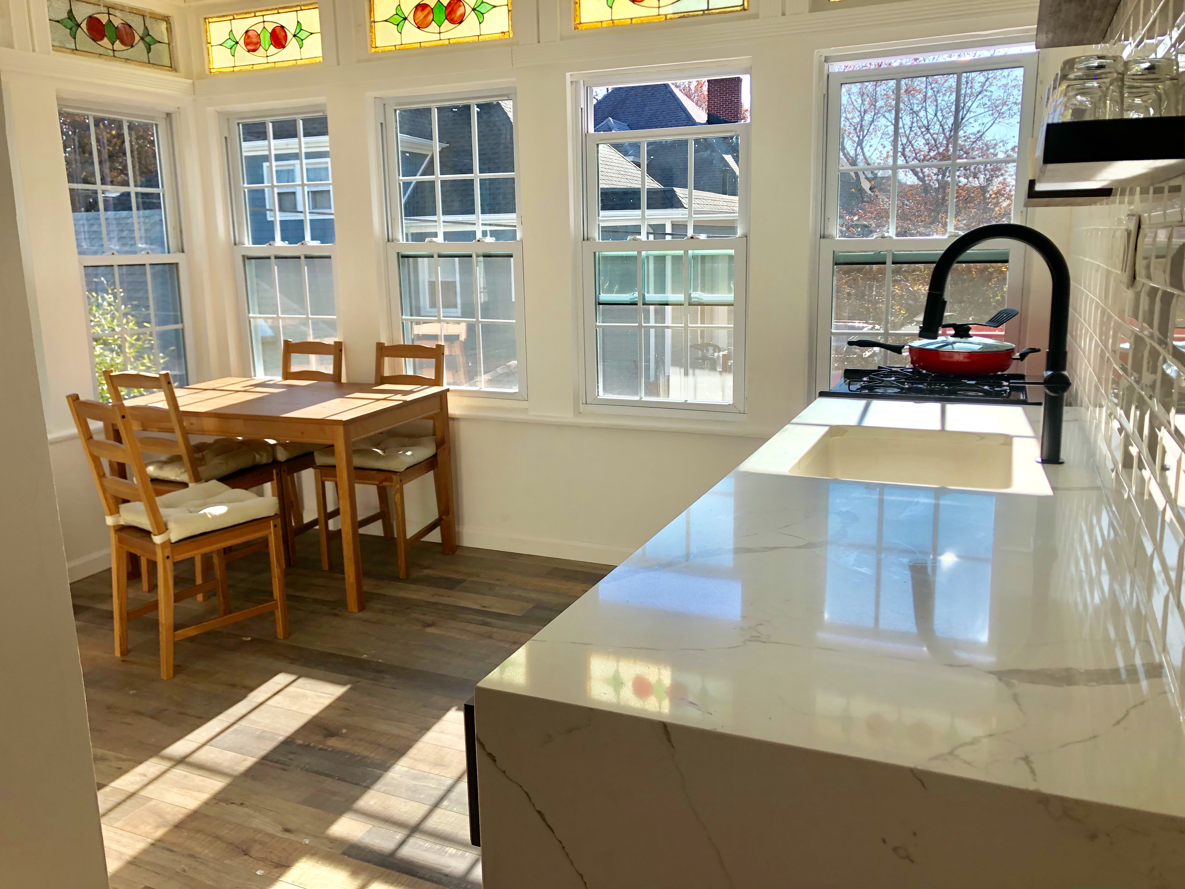 1112 Beverley Road Brooklyn, NY 11218 - Photo 38 of 53 a dining table with chairs and window