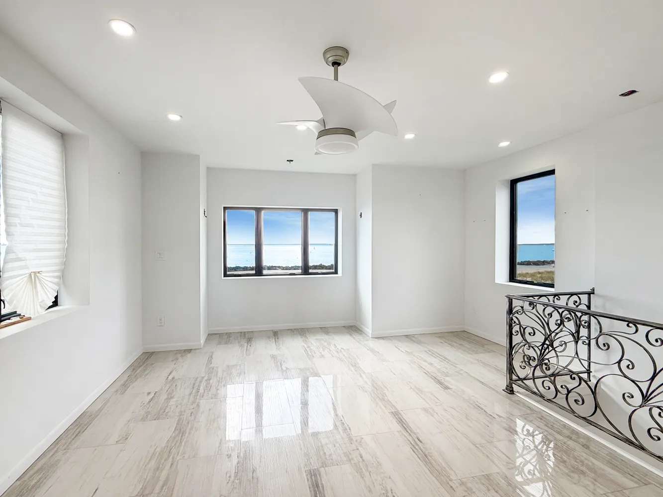 a view of an empty room and glass door
