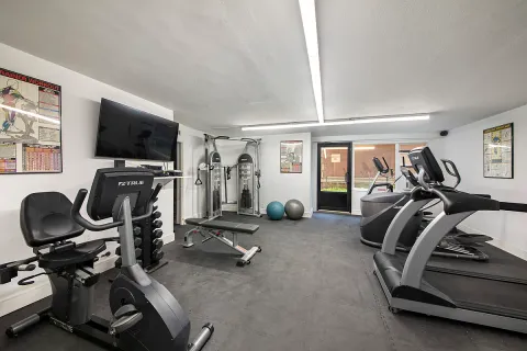 a view of a room with gym equipment