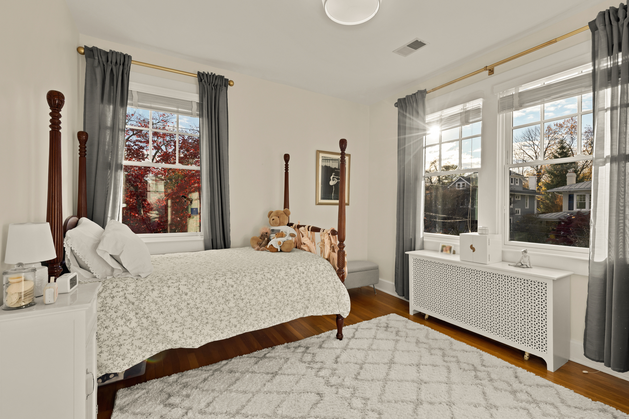 6815 Delaware Street Chevy Chase, MD 20815 - Photo 14 of 34 a bedroom with a large bed and a large window