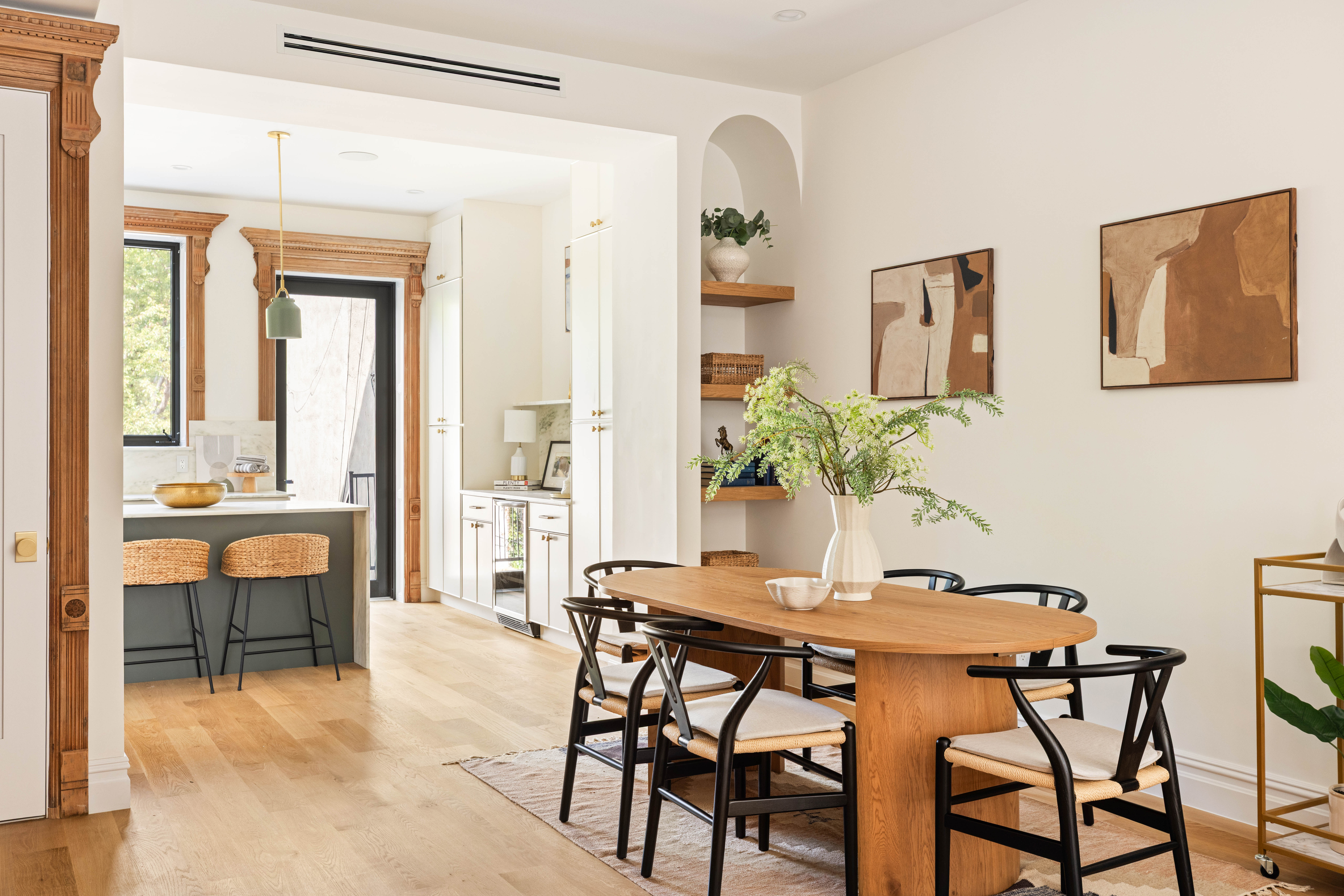 707 Macon Street Brooklyn, NY 11233 - Photo 4 of 16 a view of a dining room with furniture and chandelier