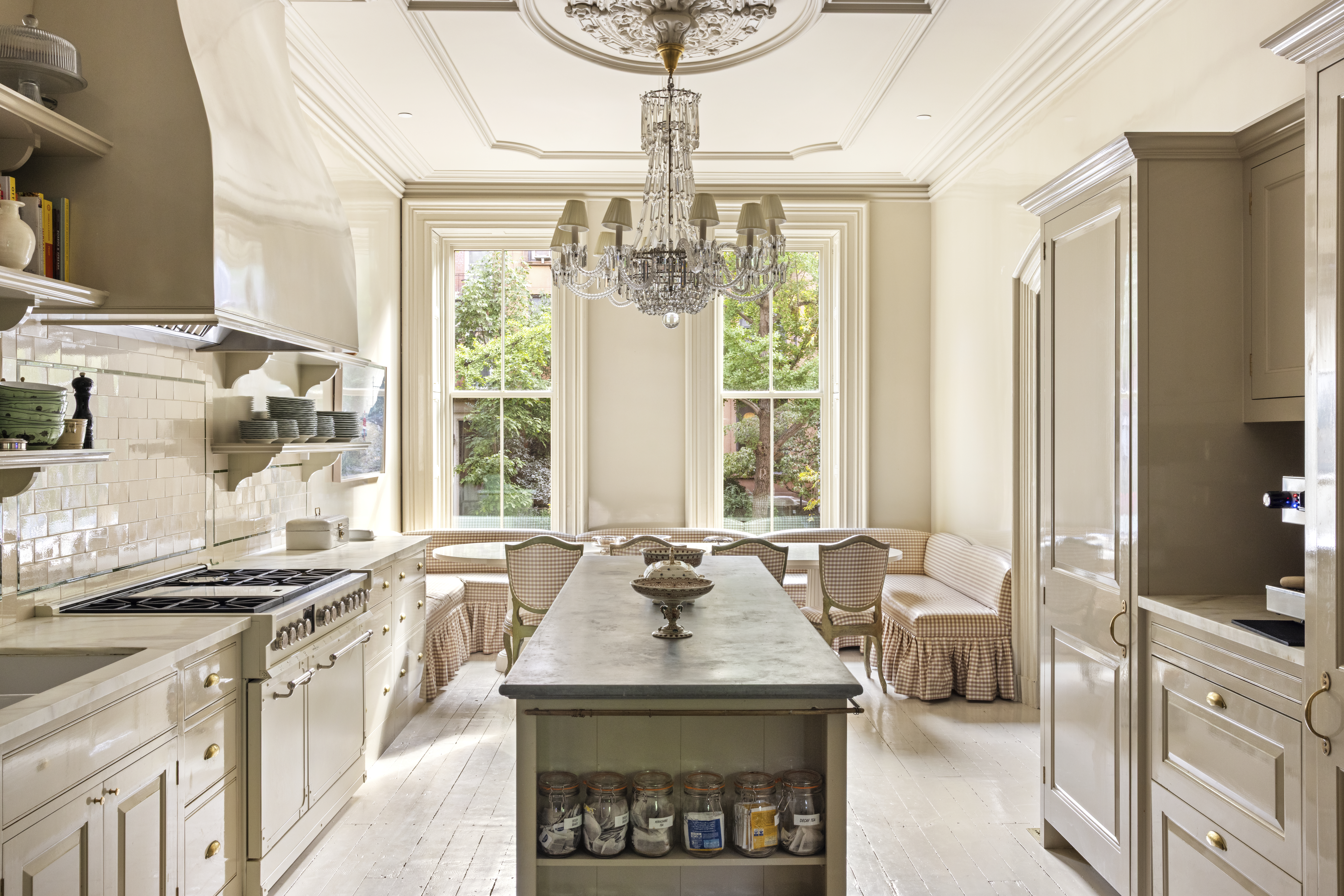 381 Union Street Brooklyn, NY 11231 - Photo 8 of 29 a kitchen with stainless steel appliances a sink a stove and a chandelier