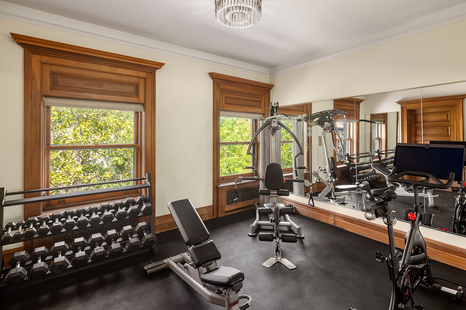 18 Prospect Park West Brooklyn, NY 11215 - Photo 28 of 40 a room with gym equipment and a large window