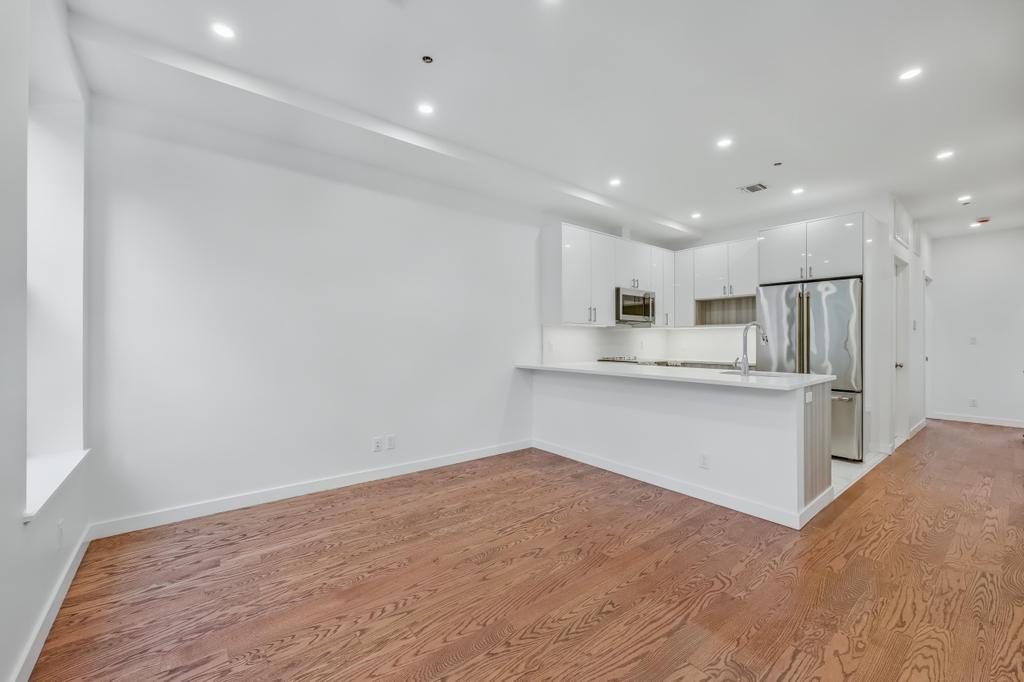 109 President Street, Unit 3 Brooklyn, NY 11231 - Photo 9 of 18 a view of kitchen with wooden floor