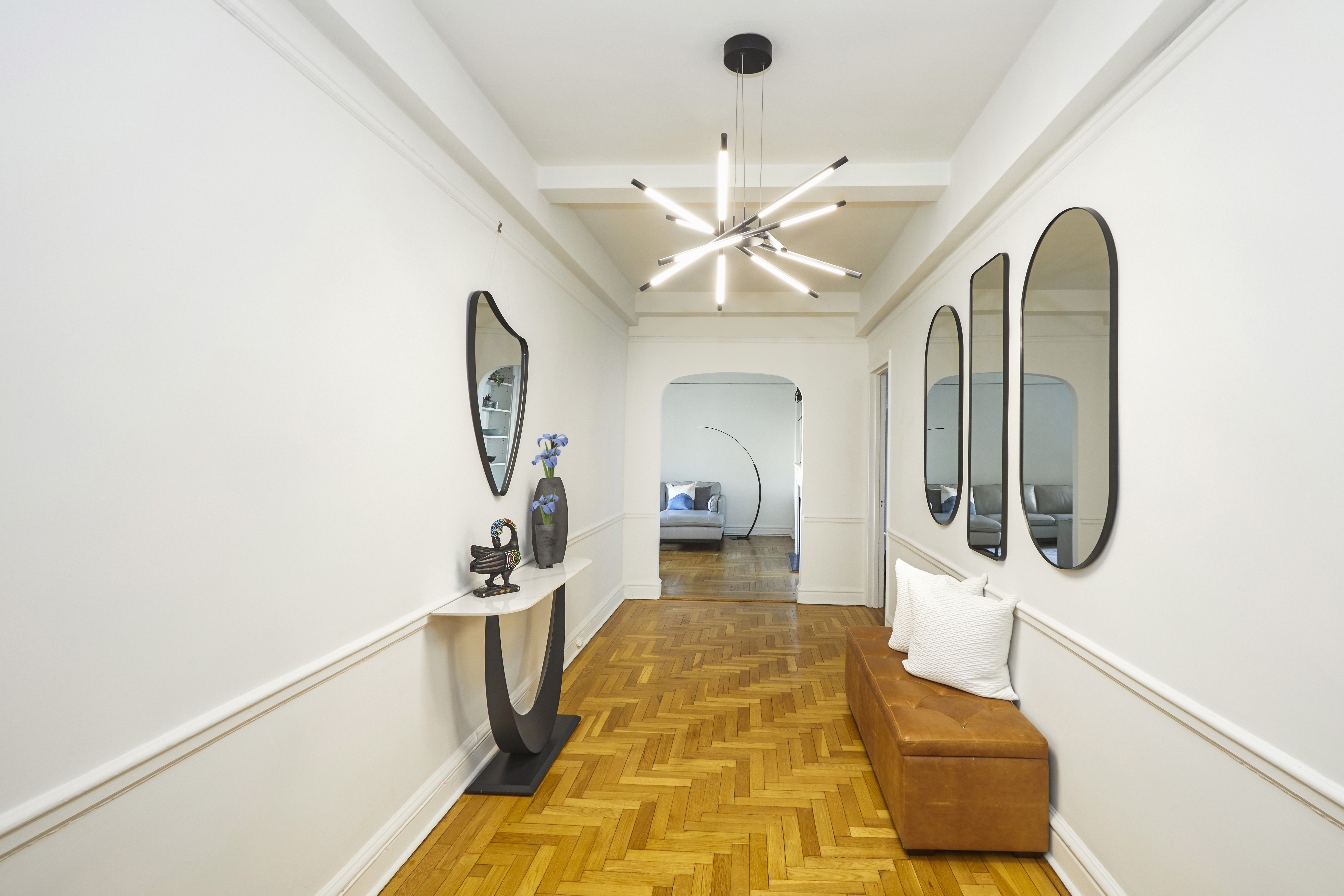 135 Eastern Parkway, Unit 9I Brooklyn, NY 11238 - Photo 11 of 17 a view of a hallway with windows