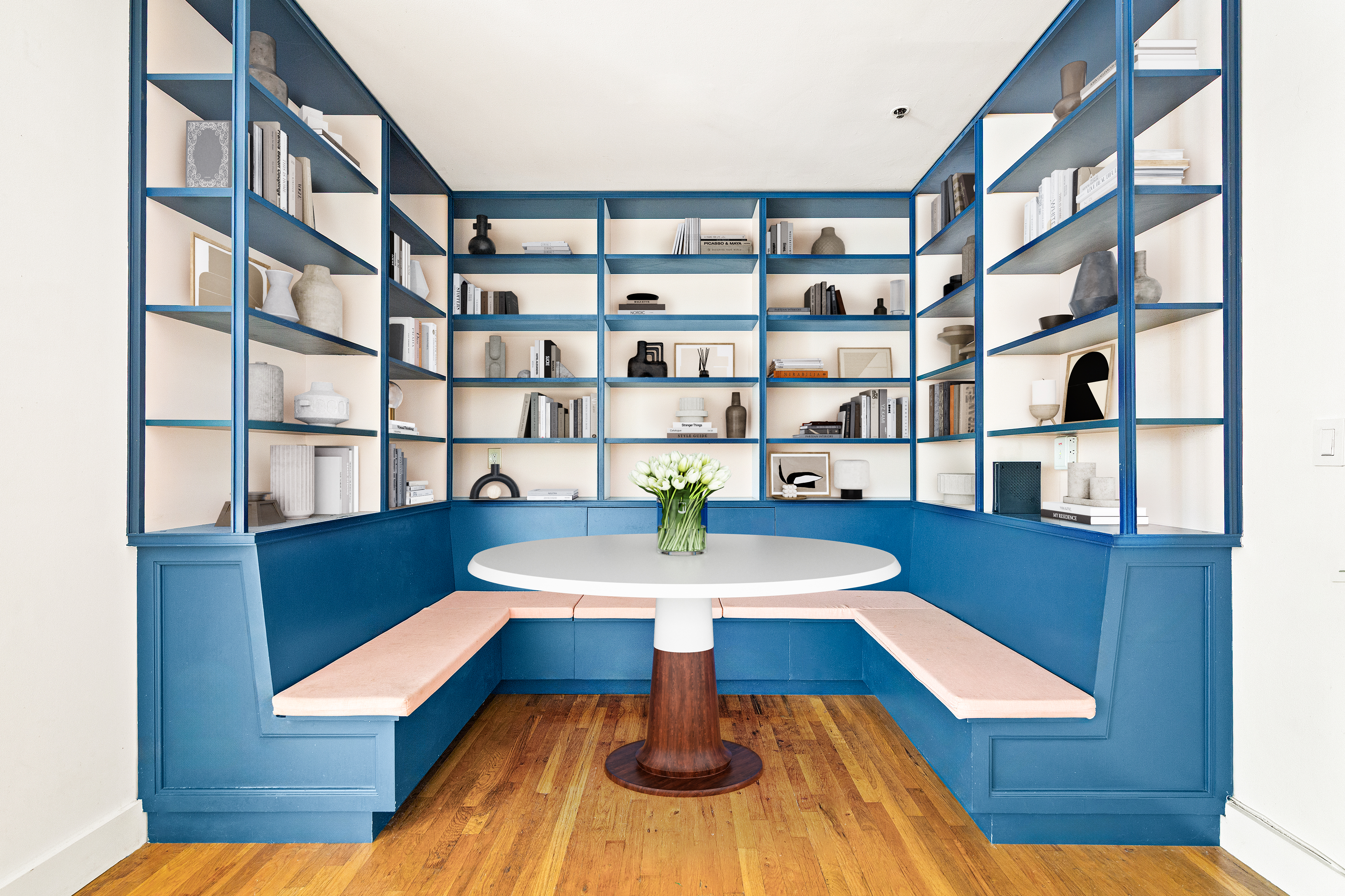 372 Dekalb Avenue, Unit 1I Brooklyn, NY 11205 - Photo 2 of 11 a living room with furniture and a book shelf