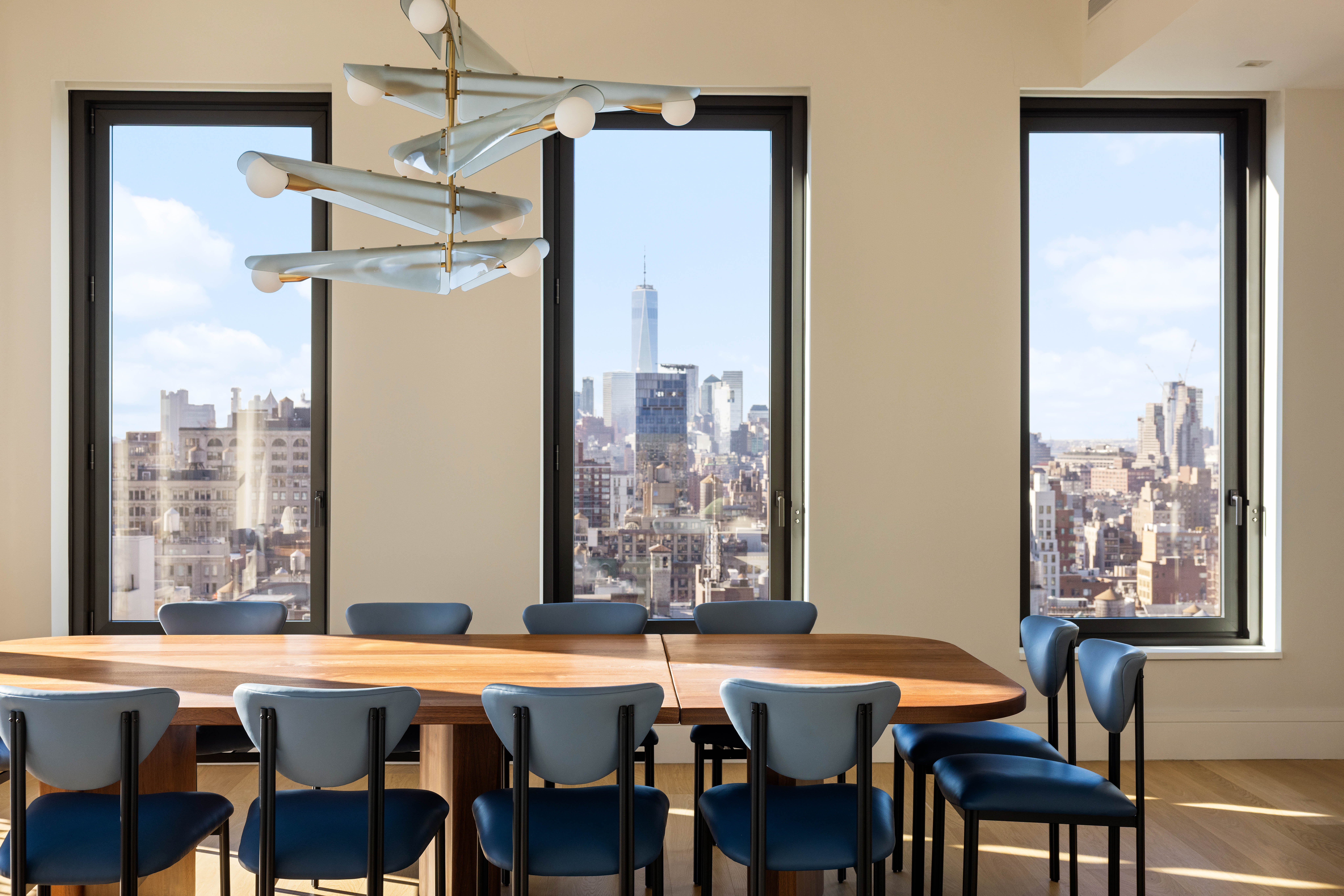 39 West 23rd Street, Unit PH Manhattan, NY 10010 - Photo 3 of 20 a view of a dining room with furniture window and wooden floor