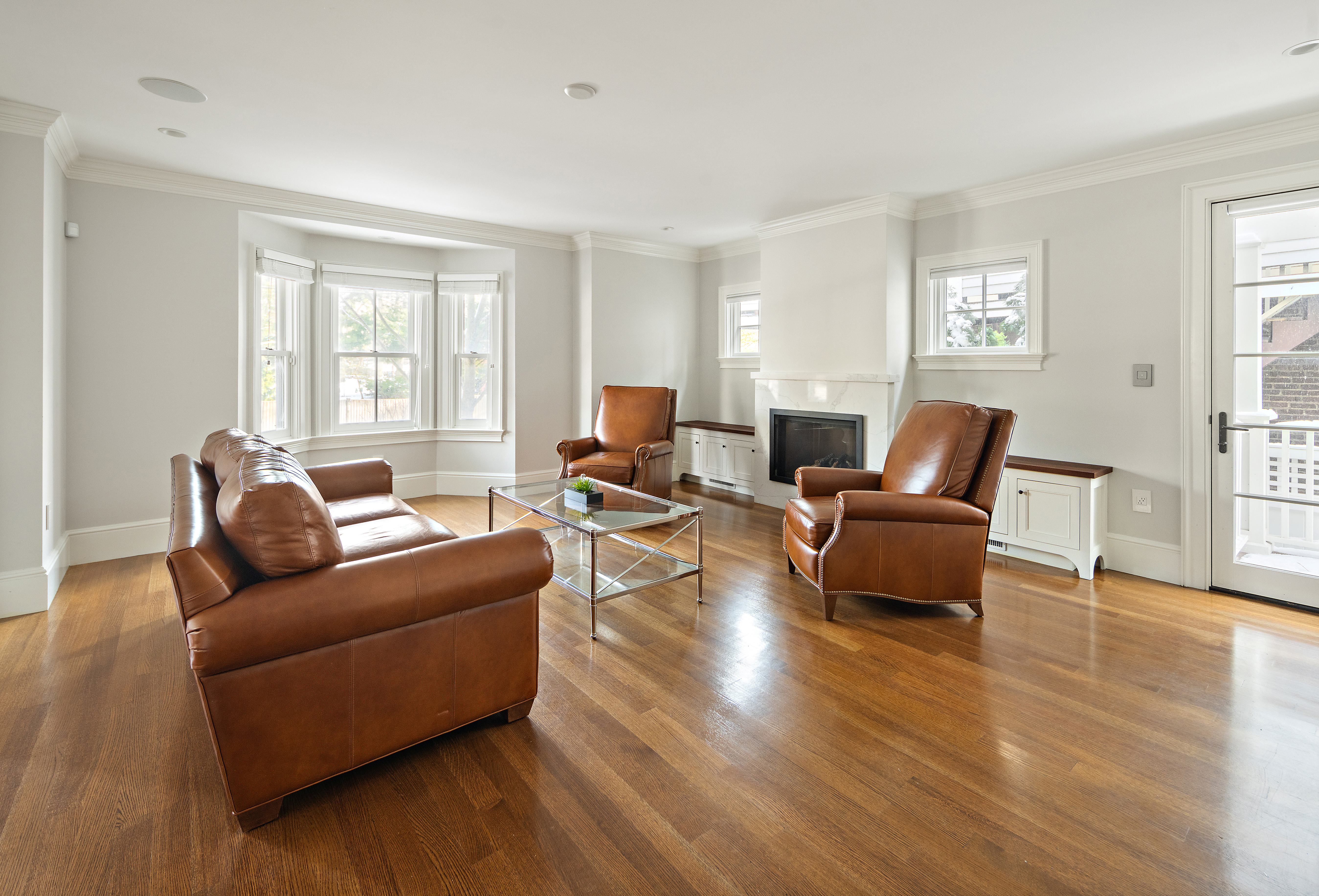 35 Willard Street Cambridge, MA 02138 - Photo 22 of 36 a living room with furniture and a wooden floor