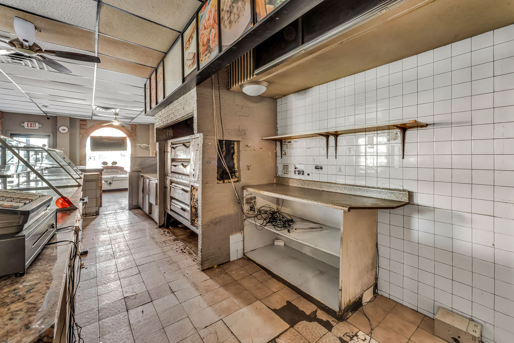 601-603 Washington Street, Unit RESTAURANT Hoboken, NJ 07030 - Photo 14 of 27 a kitchen with stainless steel appliances granite countertop a sink and cabinets