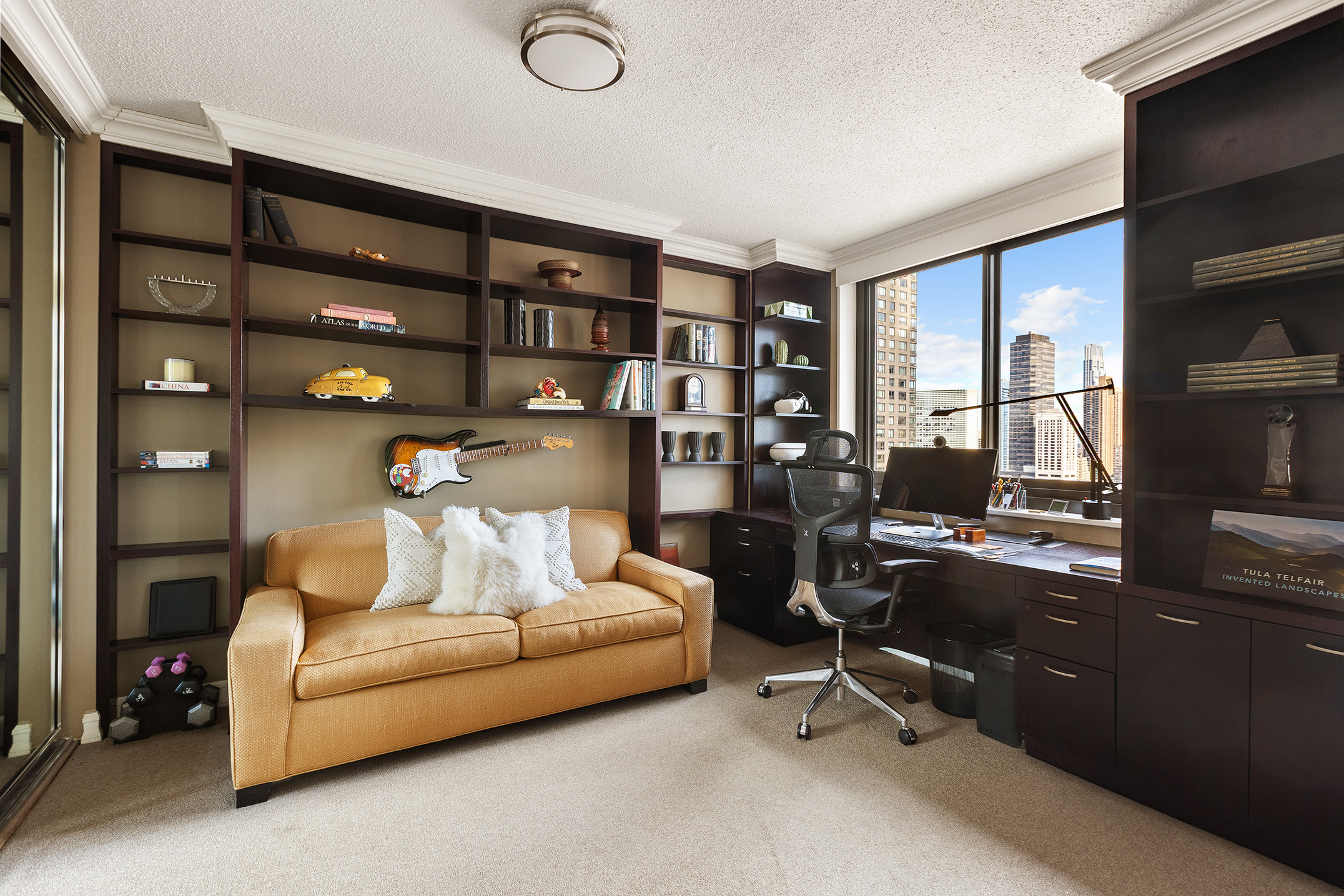 347 West 57th Street, Unit 25AB Manhattan, NY 10019 - Photo 14 of 21 a living room with furniture