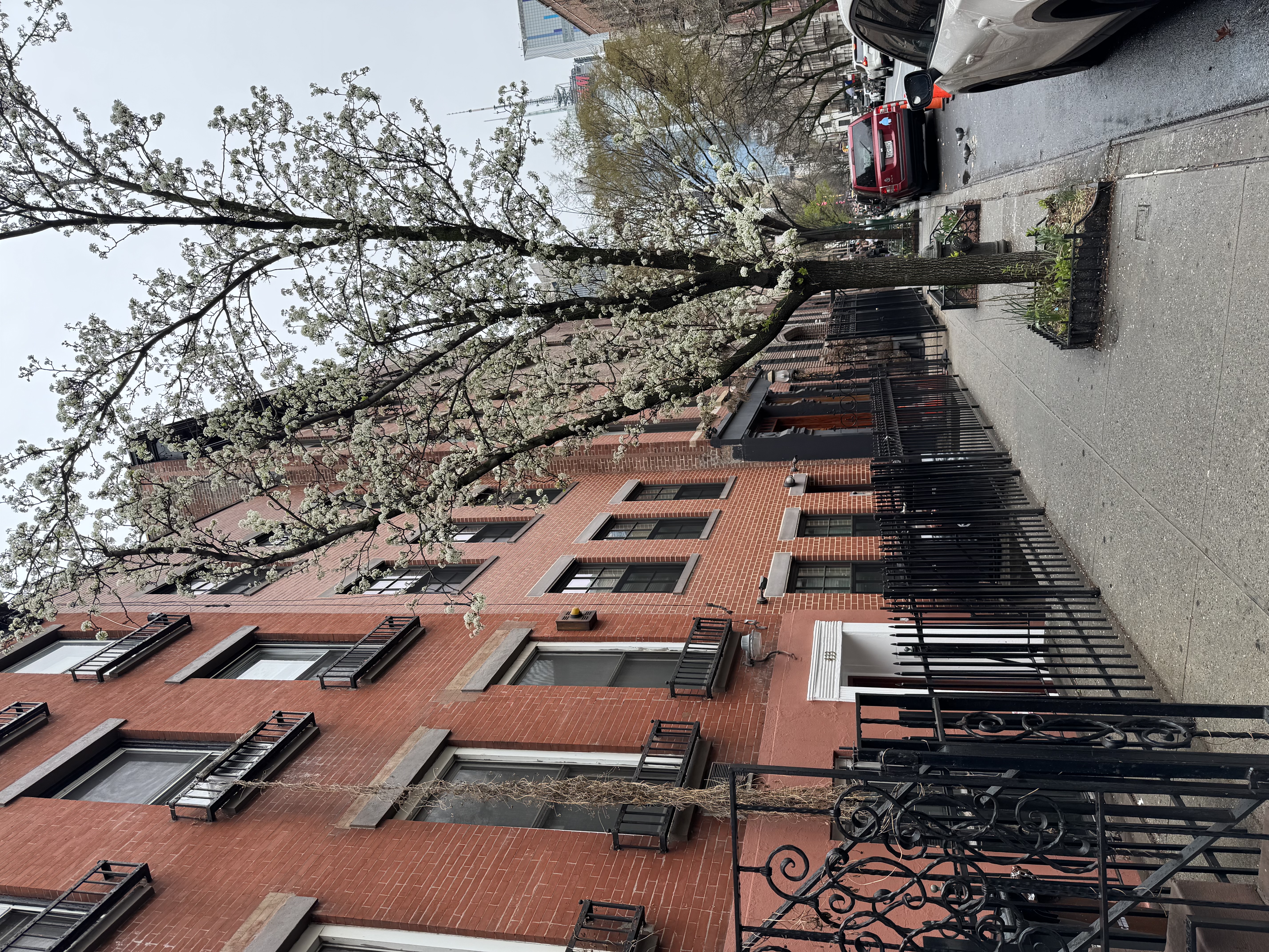 451 West 44th Street, Unit 5 Manhattan, NY 10036 - Photo 4 of 12 a row of cars parked on the side of street
