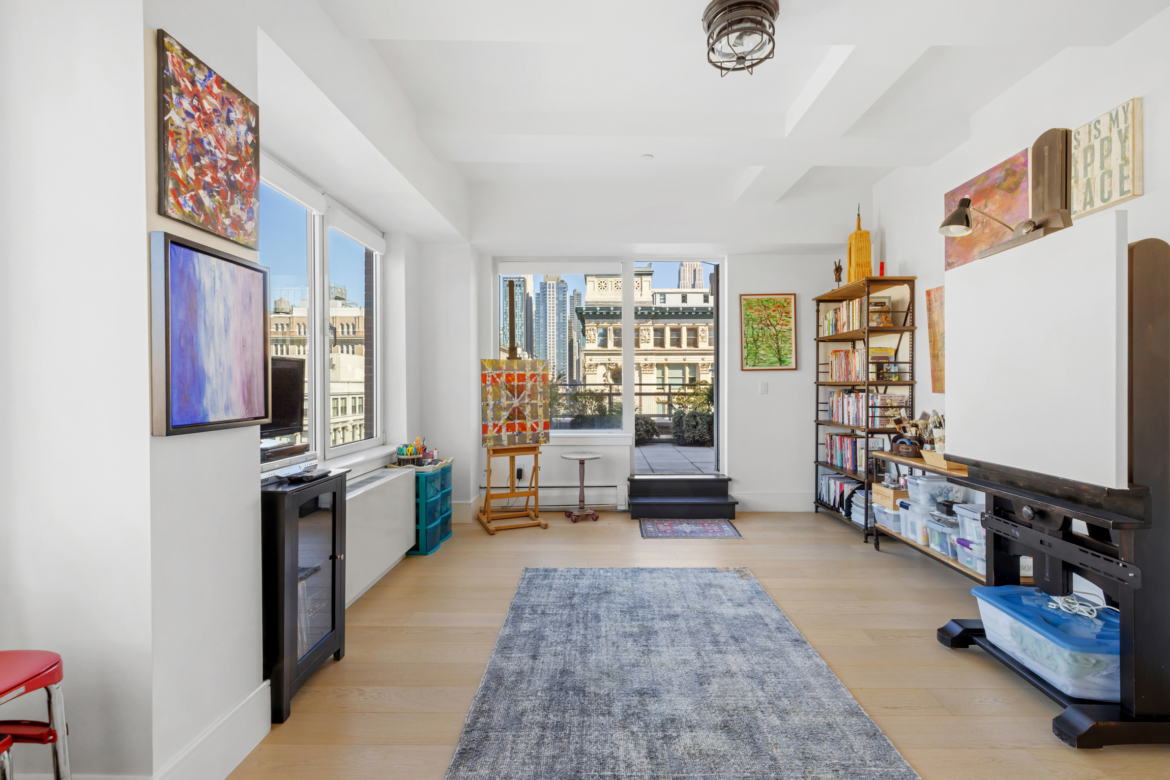 63 West 17th Street, Unit 7A Manhattan, NY 10011 - Photo 20 of 32 a view of living room with furniture and window