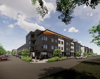 a front view of a building with garden street and car parked