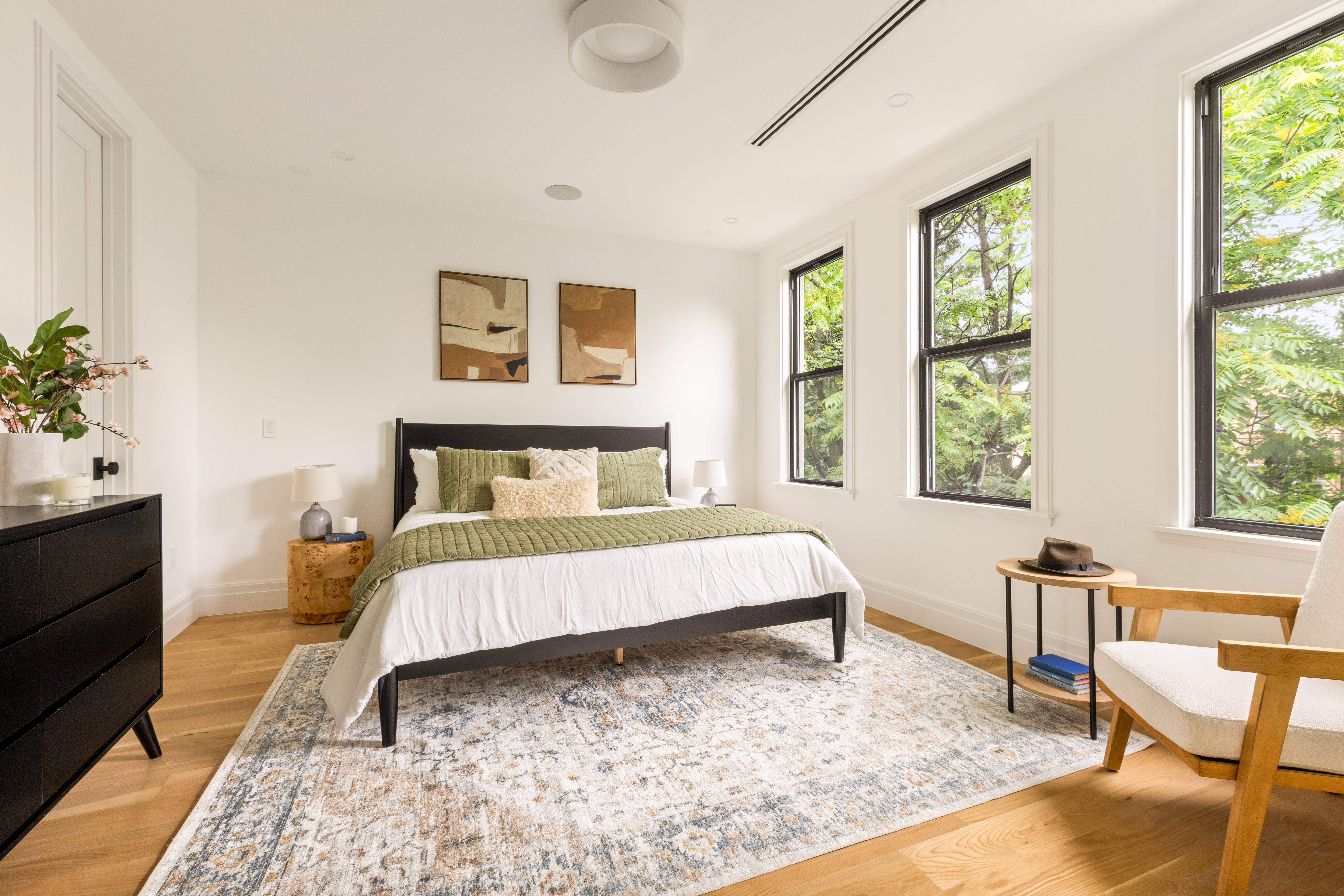 173 8th Street Brooklyn, NY 11215 - Photo 6 of 17 a bedroom with a bed and a table in it