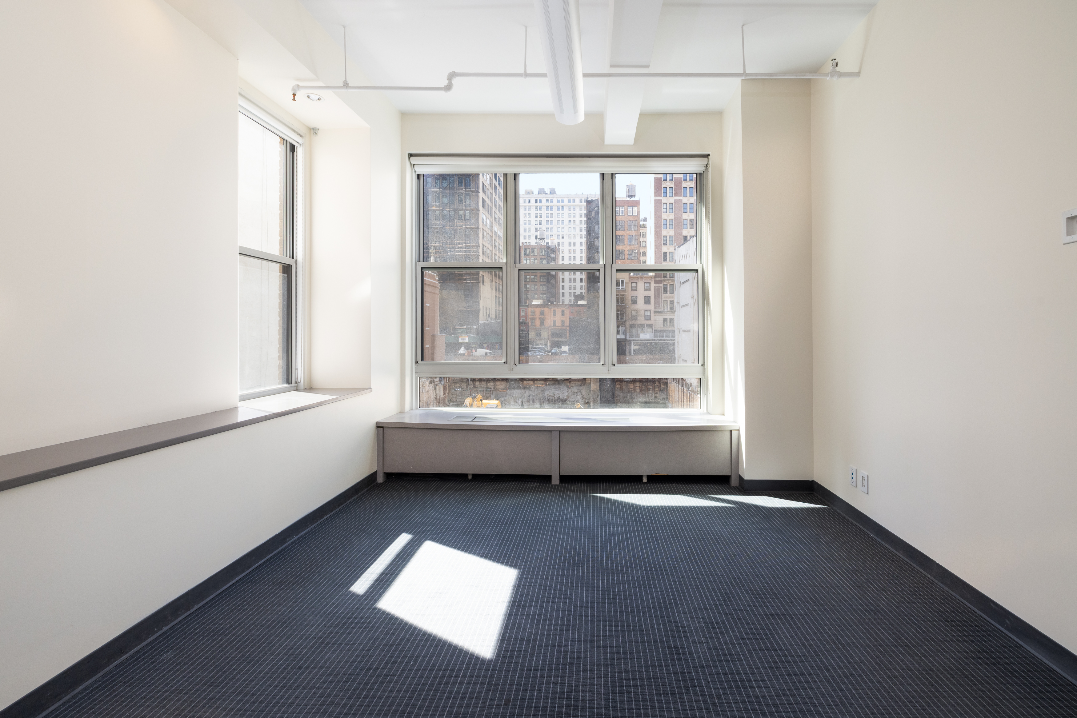 11 West 30th Street, Unit 2F Manhattan, NY 10001 - Photo 3 of 12 a view of workspace with window