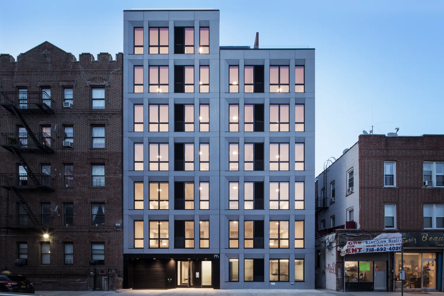 a view of a building and a book shelf