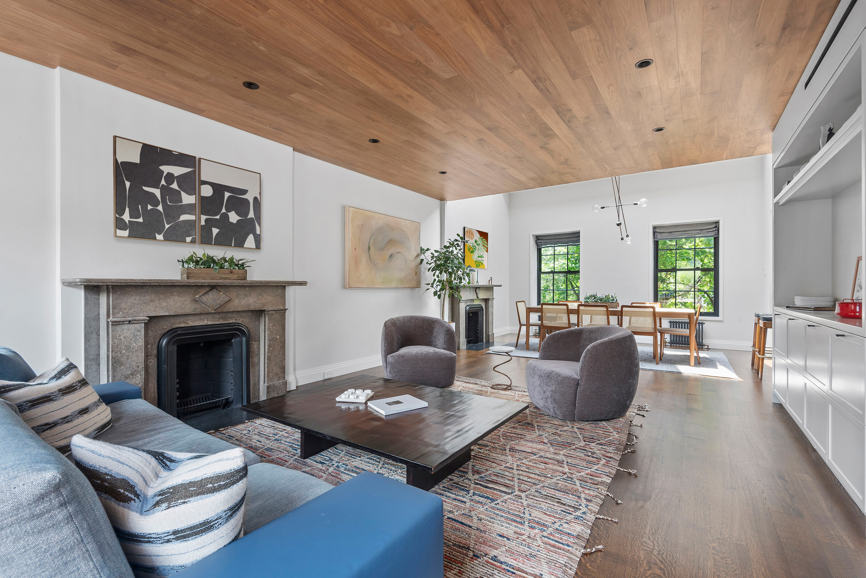 a living room with furniture or couch and a fireplace