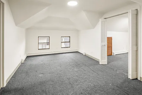 an empty room with windows