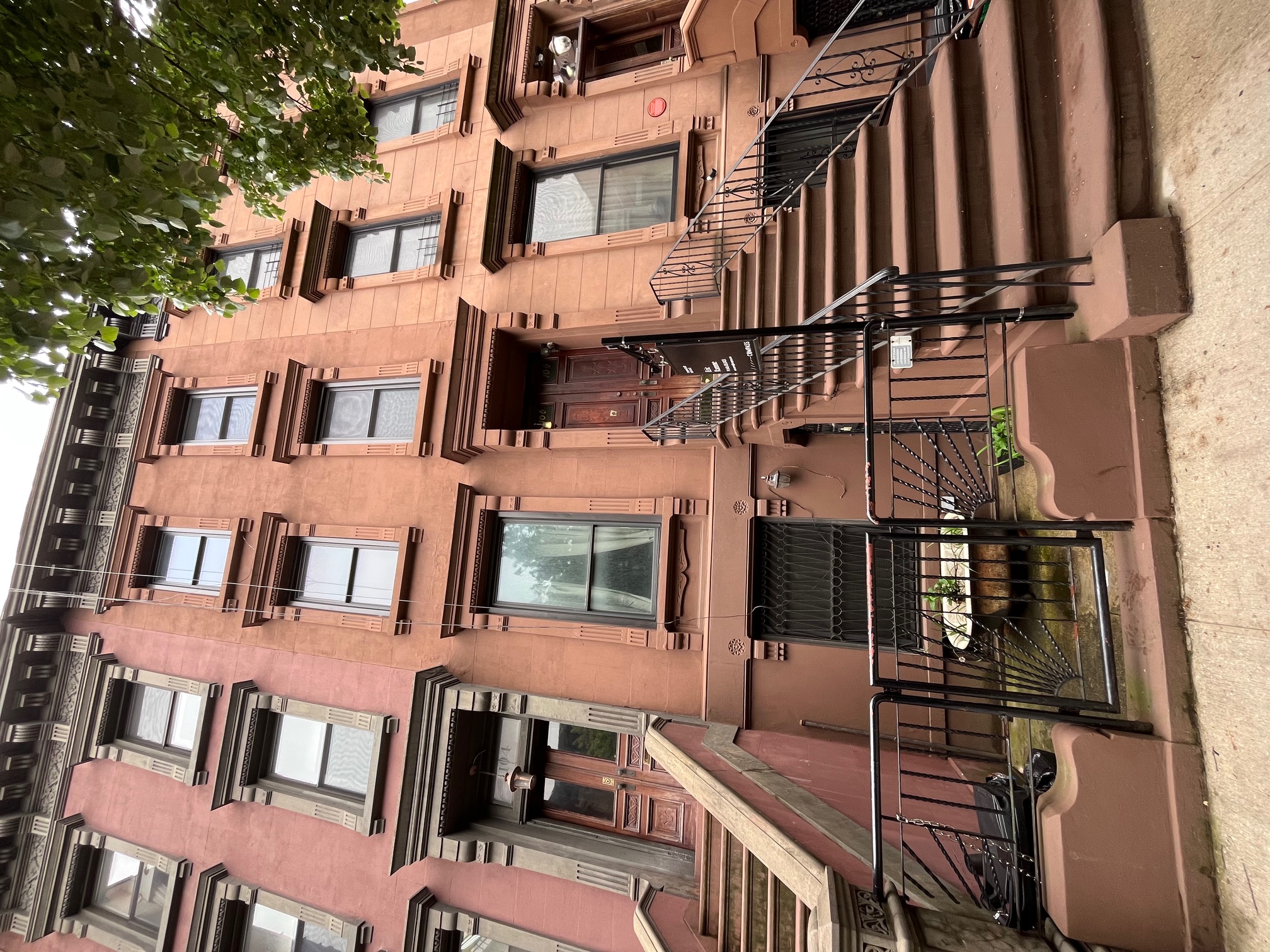 106 West 131st Street Manhattan, NY 10027 - Photo 2 of 16 a front view of a multi story building