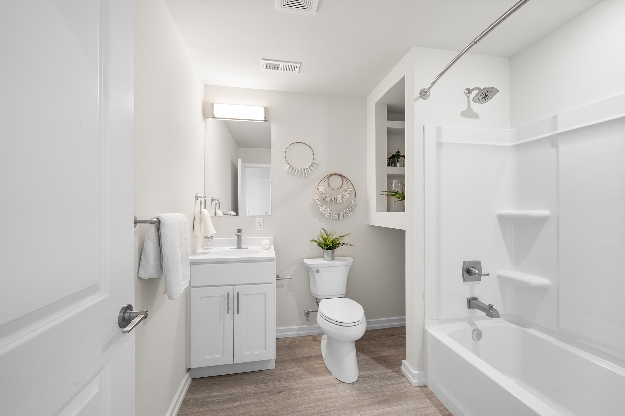 534 North 54th Street, Unit A Philadelphia, PA 19131 - Photo 21 of 22 a bathroom with a bathtub toilet sink and mirror