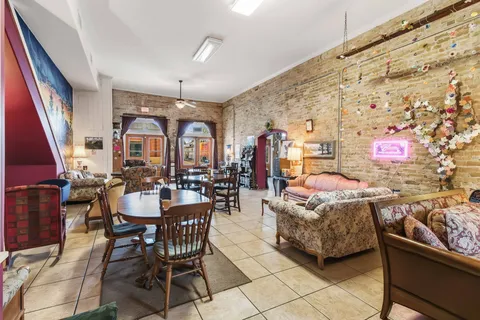 a view of a water fountain in front of building