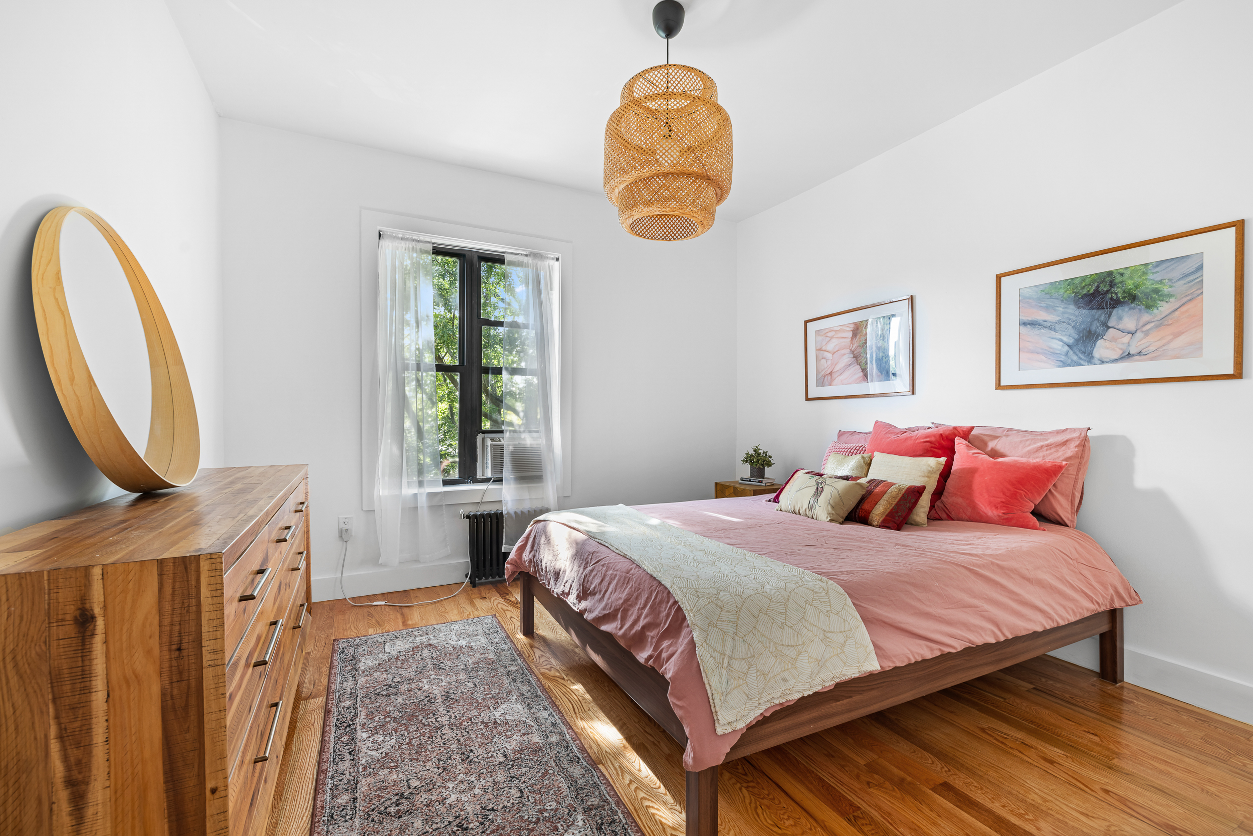 839 East 19th Street, Unit 4D Brooklyn, NY 11230 - Photo 3 of 10 a bedroom with double bed and a window