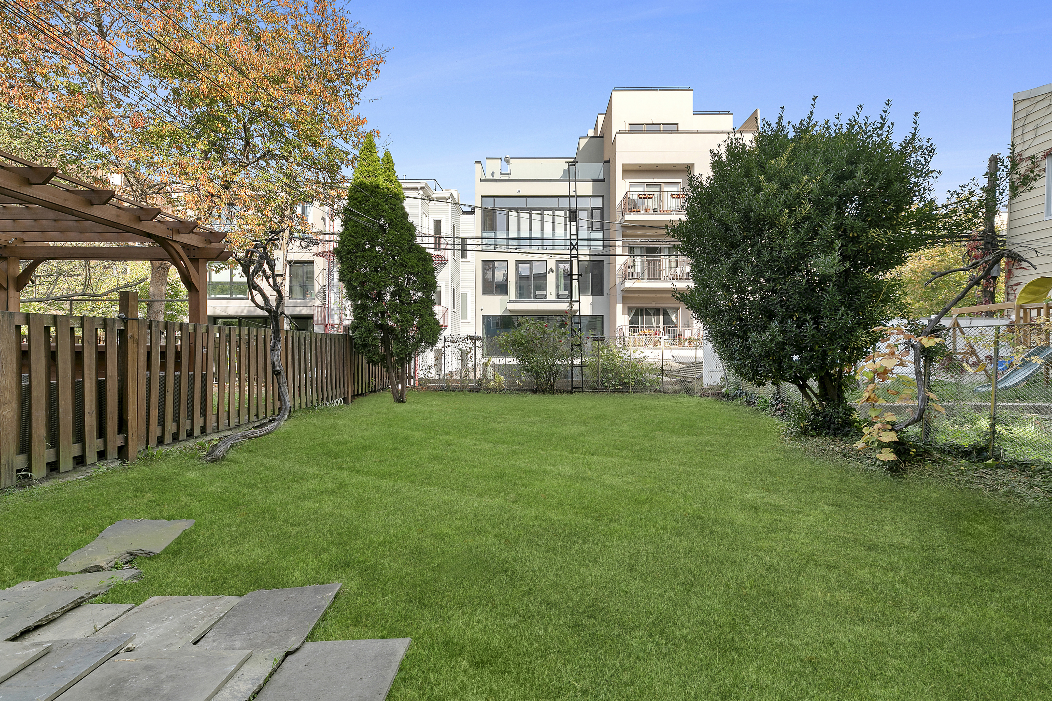 131 Java Street Brooklyn, NY 11222 - Photo 3 of 12 a front view of a house with garden