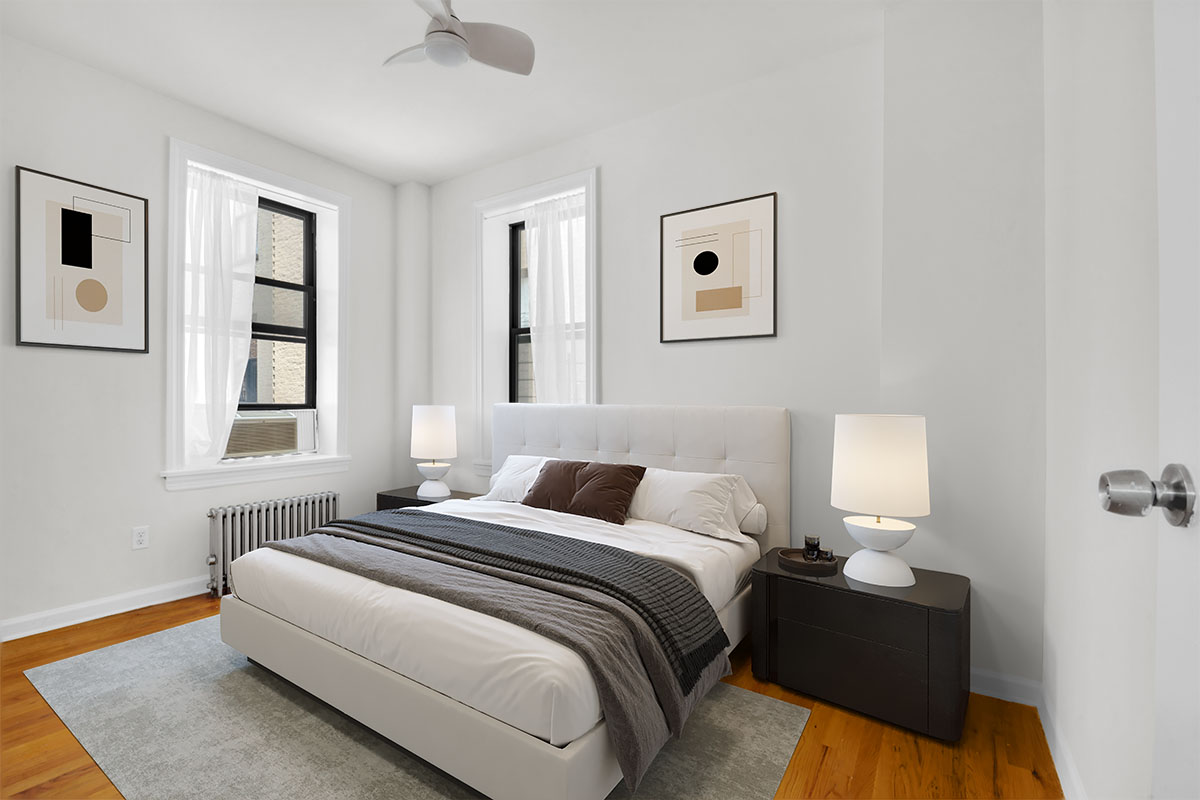 469 West 166th Street, Unit 4C Manhattan, NY 10032 - Photo 6 of 12 a bedroom with a bed and window