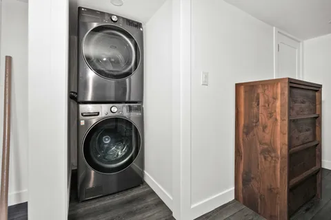 a view of storage and utility room with washer and dryer